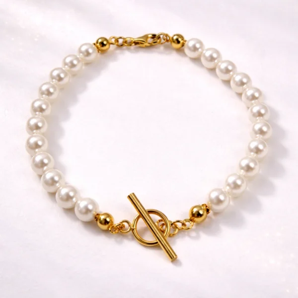 Elegancka bransoletka z pereł 6mm Lukier jewellery Bransoletka z pereł 6mm z zapięciem toggle, srebro 925 pozłacane 24k