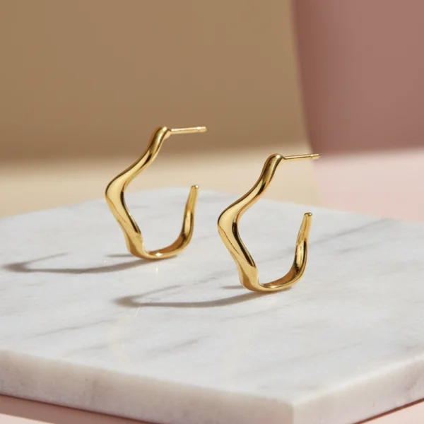 kolczyki fala o nieregularnym kształcie lukier jewellery kolczyki falowane nieregularne na sztyft, połamane koła wygięte koła, lukier jewellery